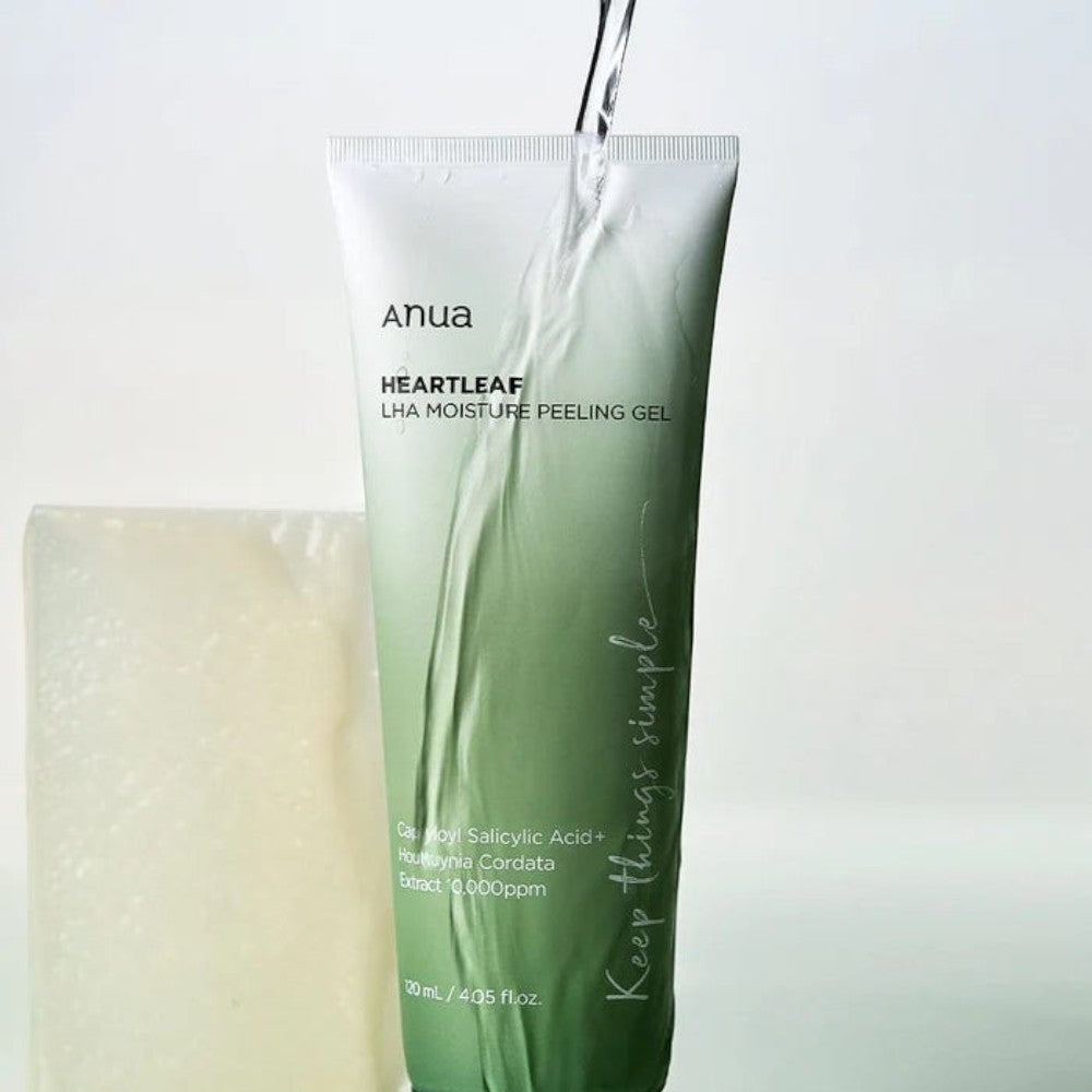 Skin TOGO Anua Heartleaf LHA Moisture Peeling Gel tube with water pouring over it, highlighting skincare texture.