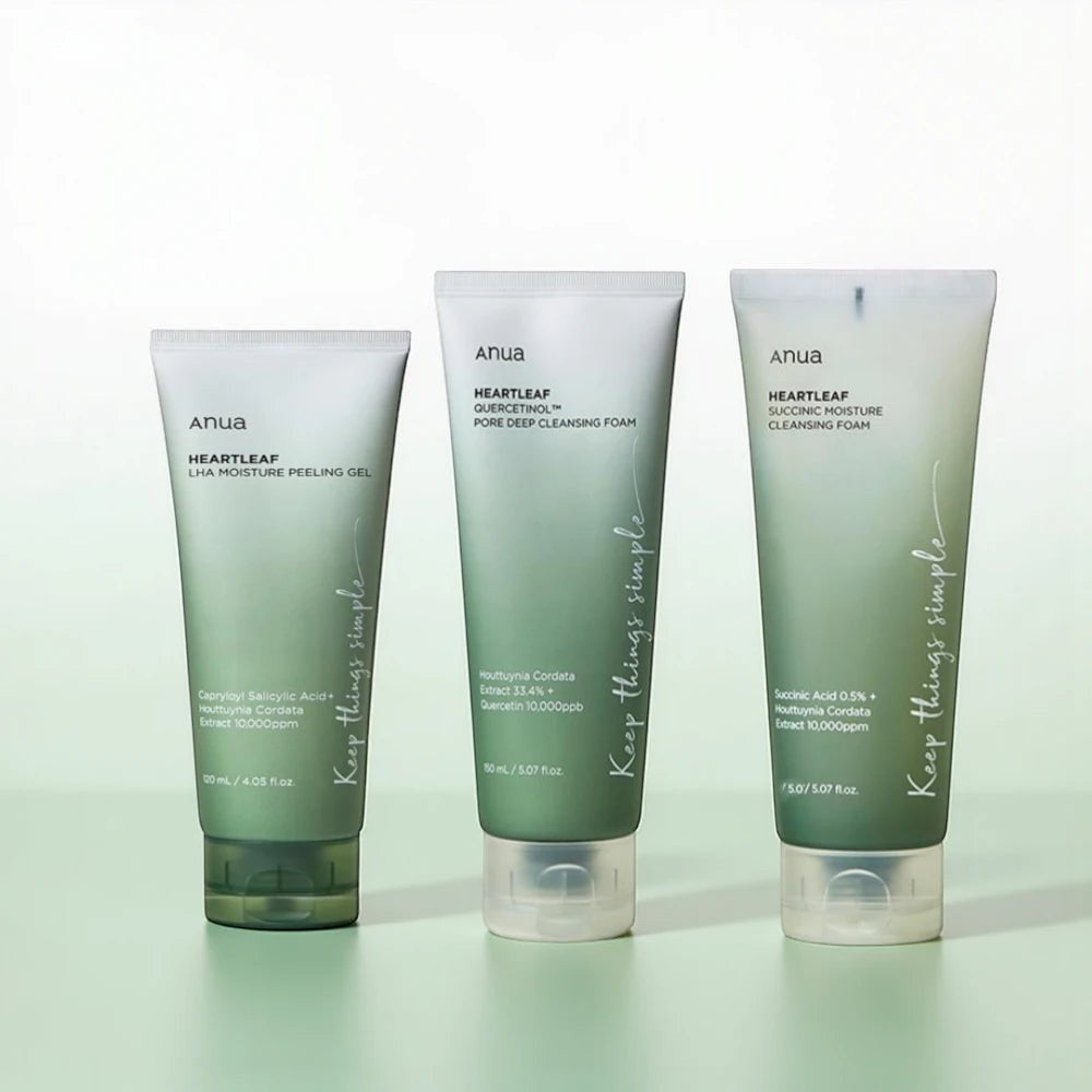 Skin TOGO Anua Heartleaf skincare collection featuring a peeling gel and two cleansing foams in gradient green tubes.