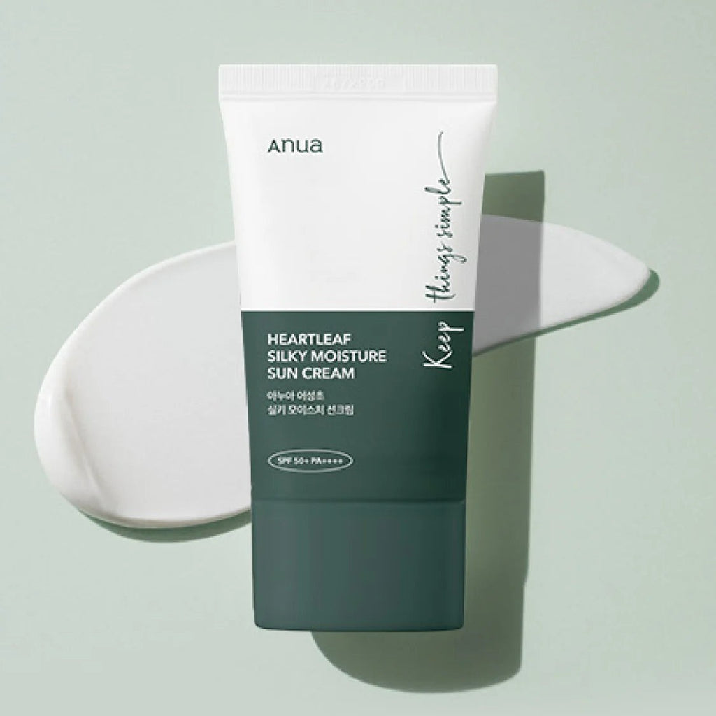 Skin TOGO Anua Heartleaf Silky Moisture Sun Cream SPF50+ in a dark green and white tube with a cream swatch.