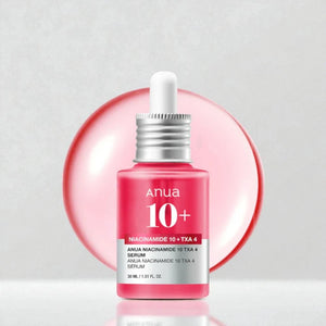 Skin TOGO Anua Niacinamide 10% + TXA 4% brightening serum in a pink 30ml dropper bottle against a soft pink background.