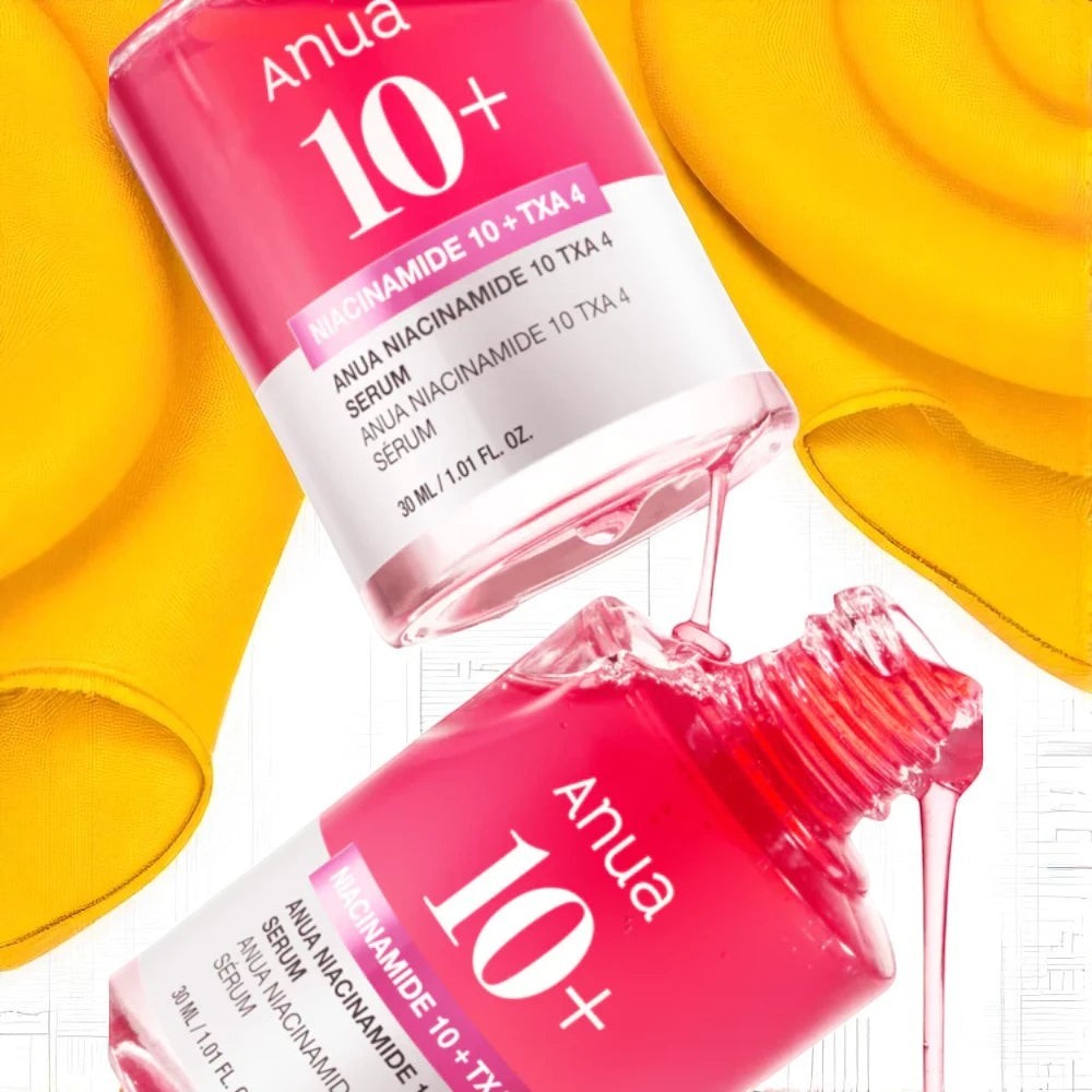Skin TOGO Anua Niacinamide 10% + TXA 4% brightening serum in a pink bottle with liquid dripping from the dropper.