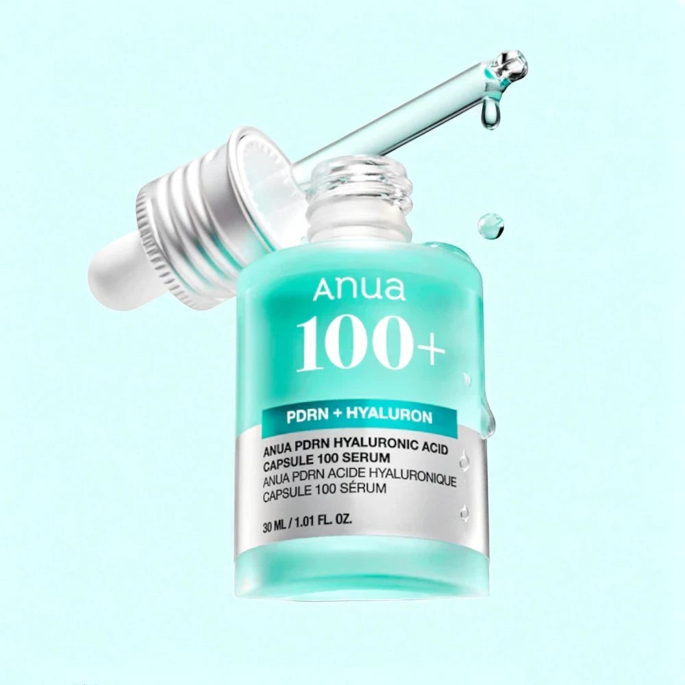 Skin TOGO Anua PDRN Hyaluronic Acid Capsule 100 Serum in a teal glass bottle with a glass dropper on a light blue background.