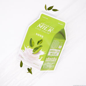 Skin TOGO A'PIEU Milk One Pack Green Tea sheet mask in a green carton-shaped pouch with milk splash and tea leaves