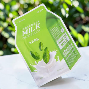 Skin TOGO A'PIEU Milk One Pack Green Tea sheet mask packaging featuring milk splash and tea leaves against green foliage