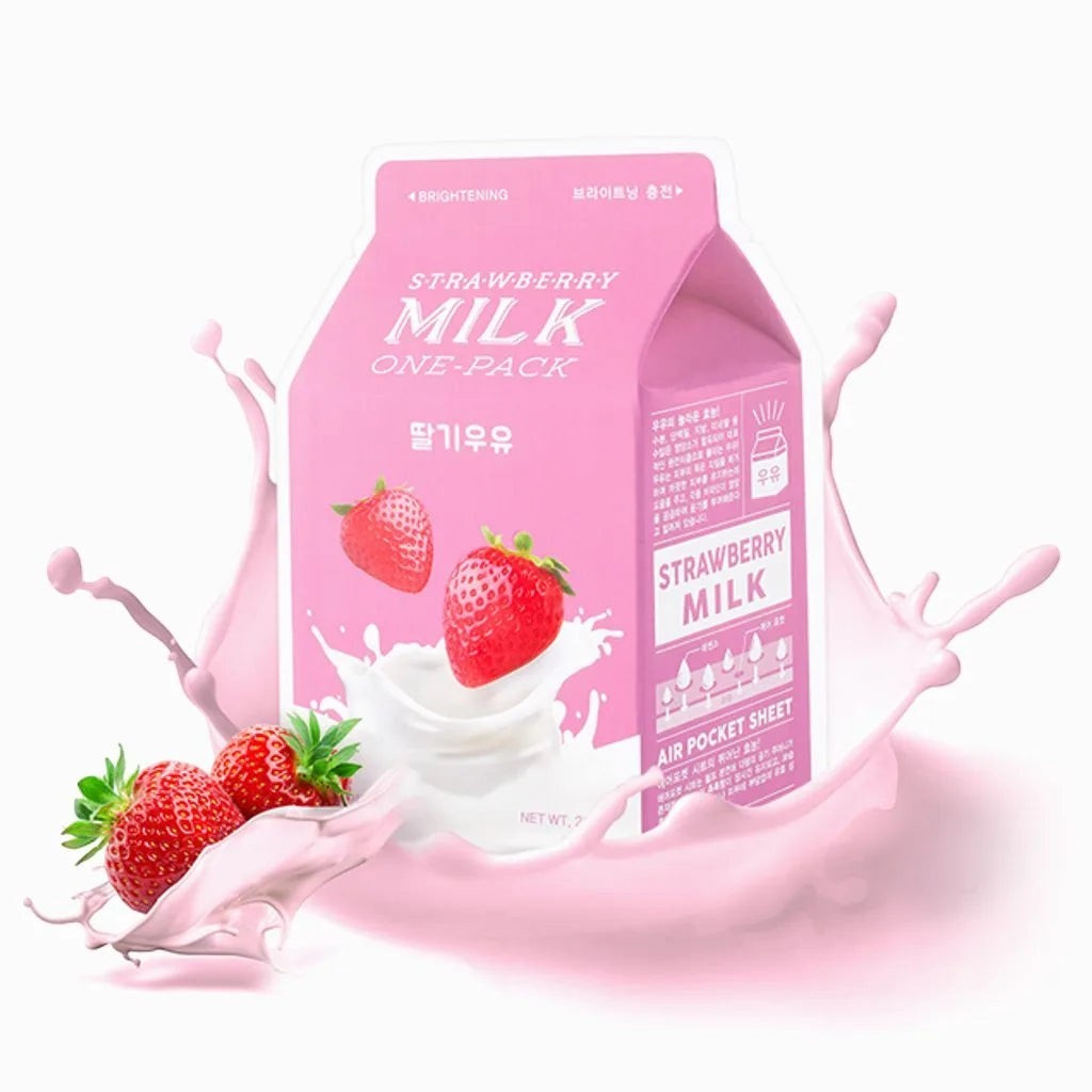Skin TOGO A'pieu Milk One Pack strawberry sheet mask in pink carton packaging with fresh strawberries and milk splash