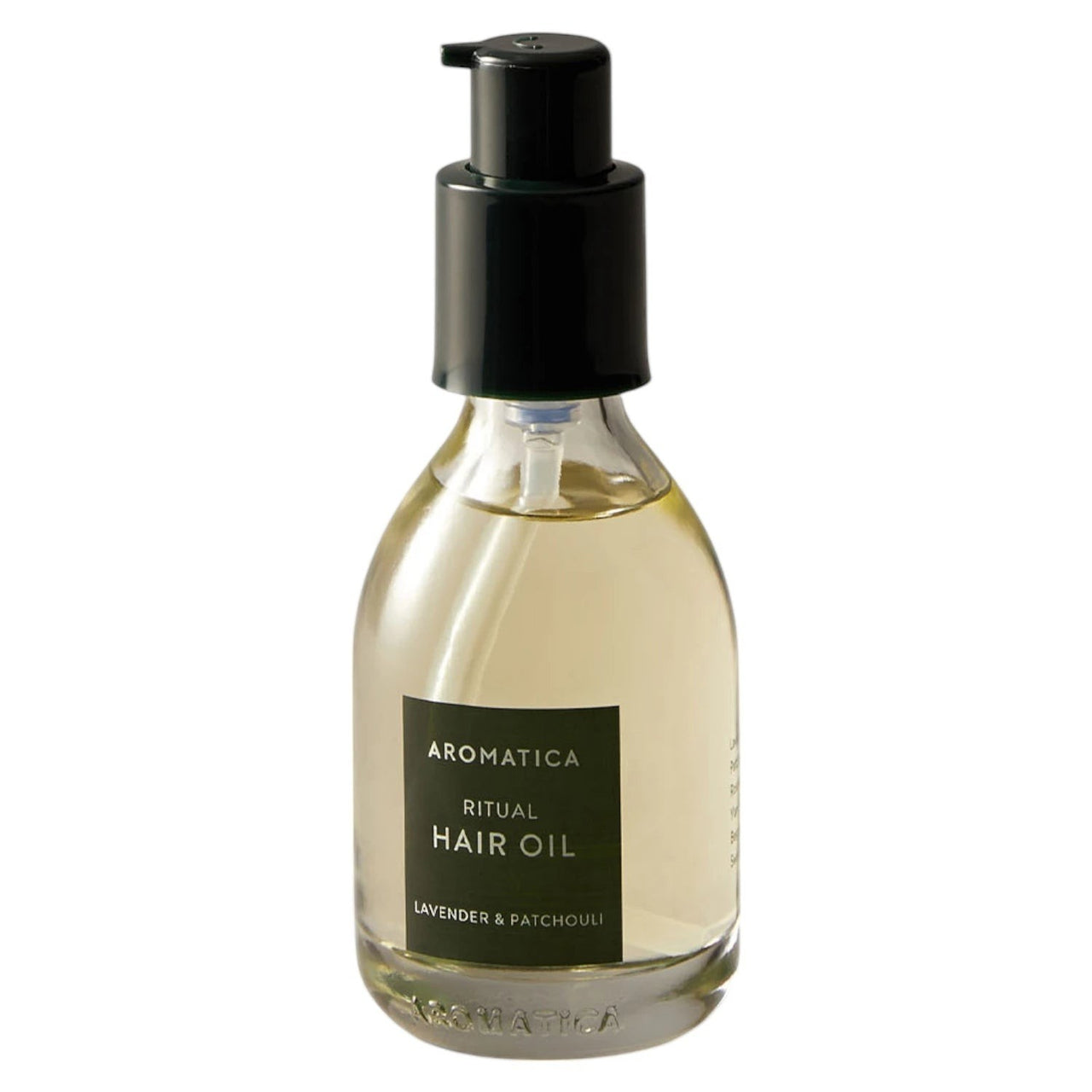 Skin TOGO Aromatica Ritual Hair Oil with lavender and patchouli in a 50ml glass bottle with a black pump dispenser.