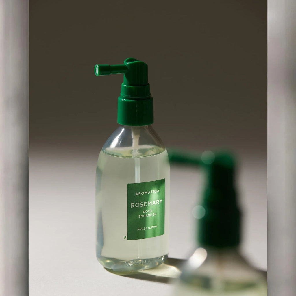 Skin TOGO Aromatica Rosemary Root Enhancer hair serum in a clear 100ml spray bottle with a green pump and label.
