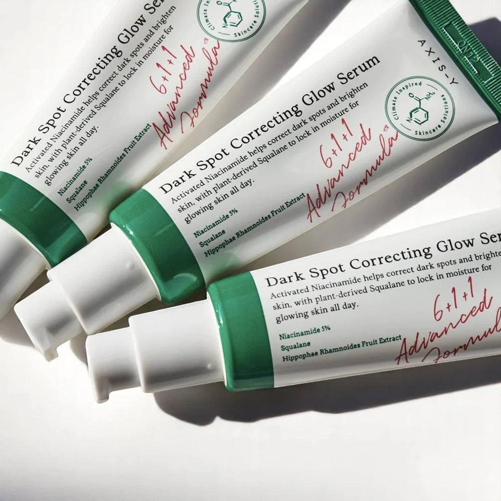 Skin TOGO Axis-Y Dark Spot Correcting Glow Serum tubes featuring niacinamide and squalane for brightening skin.