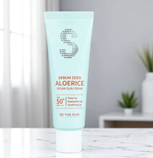 Skin TOGO Be The Skin Sebum Zero Aloerice SPF 50+ vegan sun cream in a light mint green tube for oily skin.