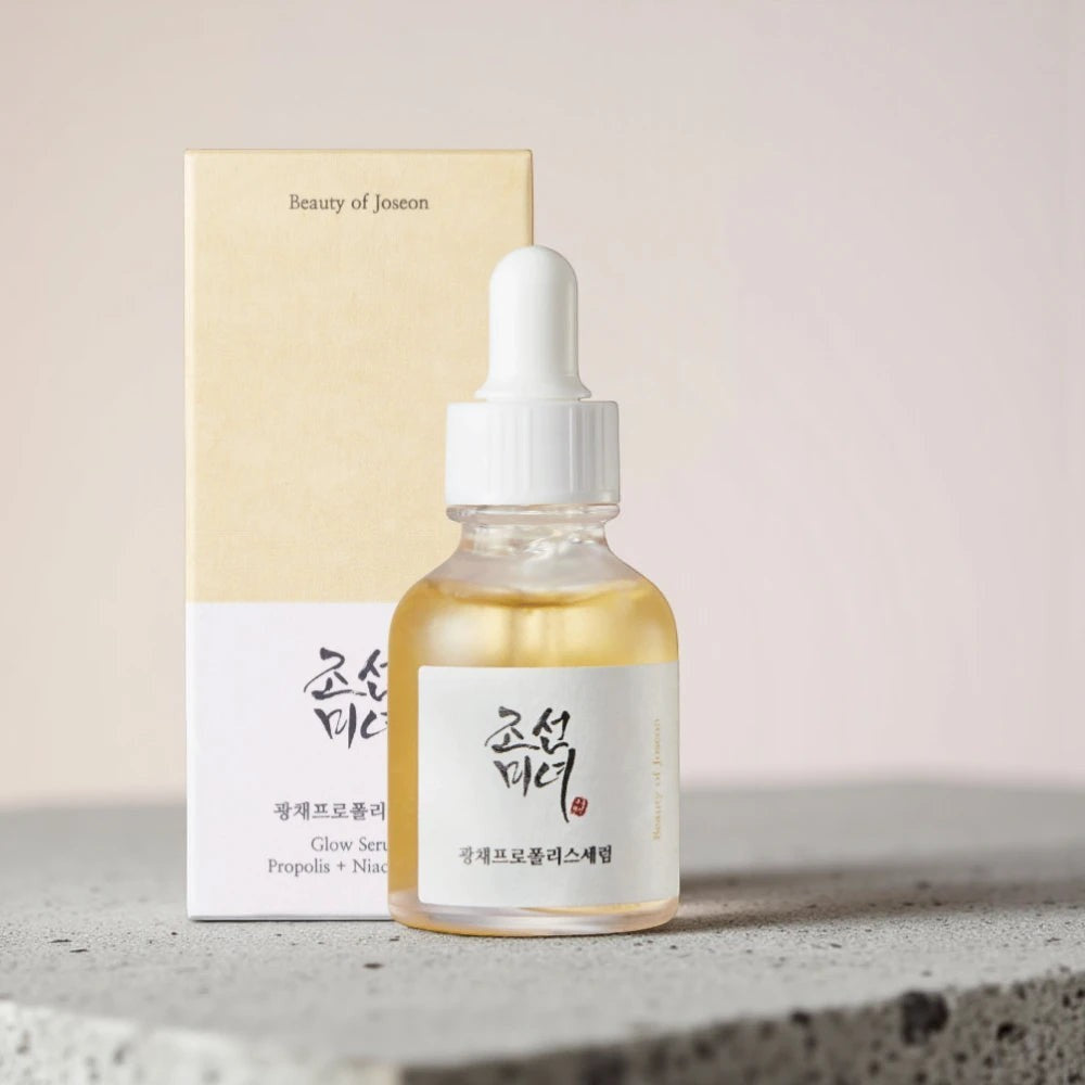 Skin TOGO Beauty of Joseon Glow Serum with propolis and niacinamide in a 30ml glass dropper bottle with its box.