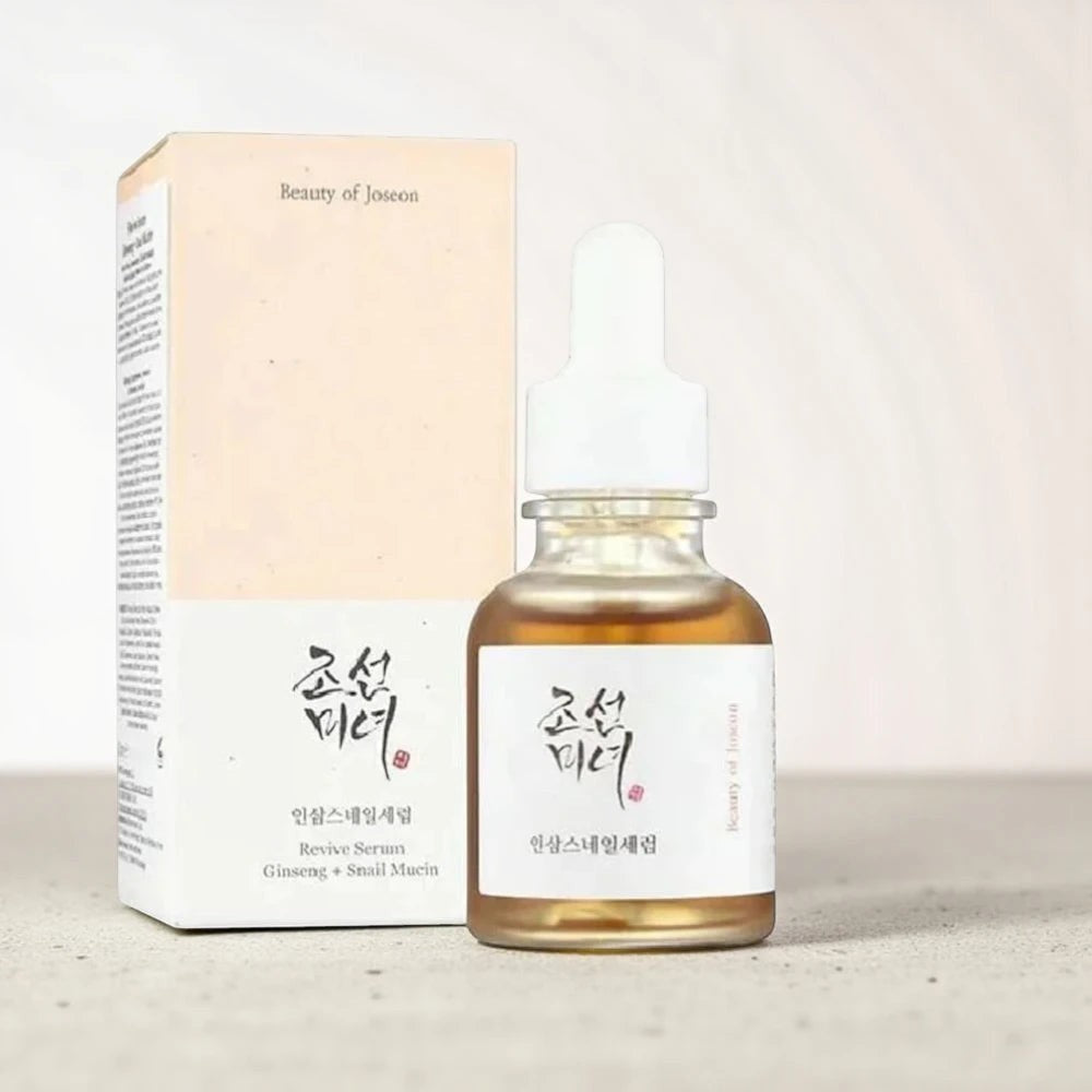 Skin TOGO Beauty of Joseon Revive Serum with ginseng and snail mucin in a 30ml glass dropper bottle with packaging.
