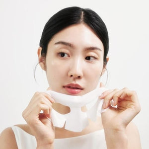 Skin TOGO Biodance Bio-Collagen Real Deep Mask being applied by a woman for skin firming and pore refinement