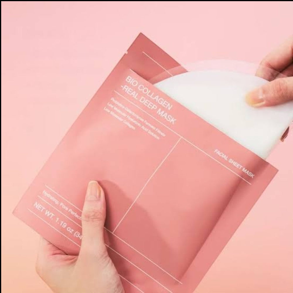 Skin TOGO Biodance Bio Collagen Real Deep Mask in pink packaging being opened to reveal the white hydrogel sheet