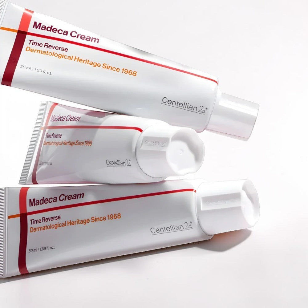 Skin TOGO Centellian 24 Madeca Cream Time Reverse anti-aging face cream tubes in white packaging with red accents.
