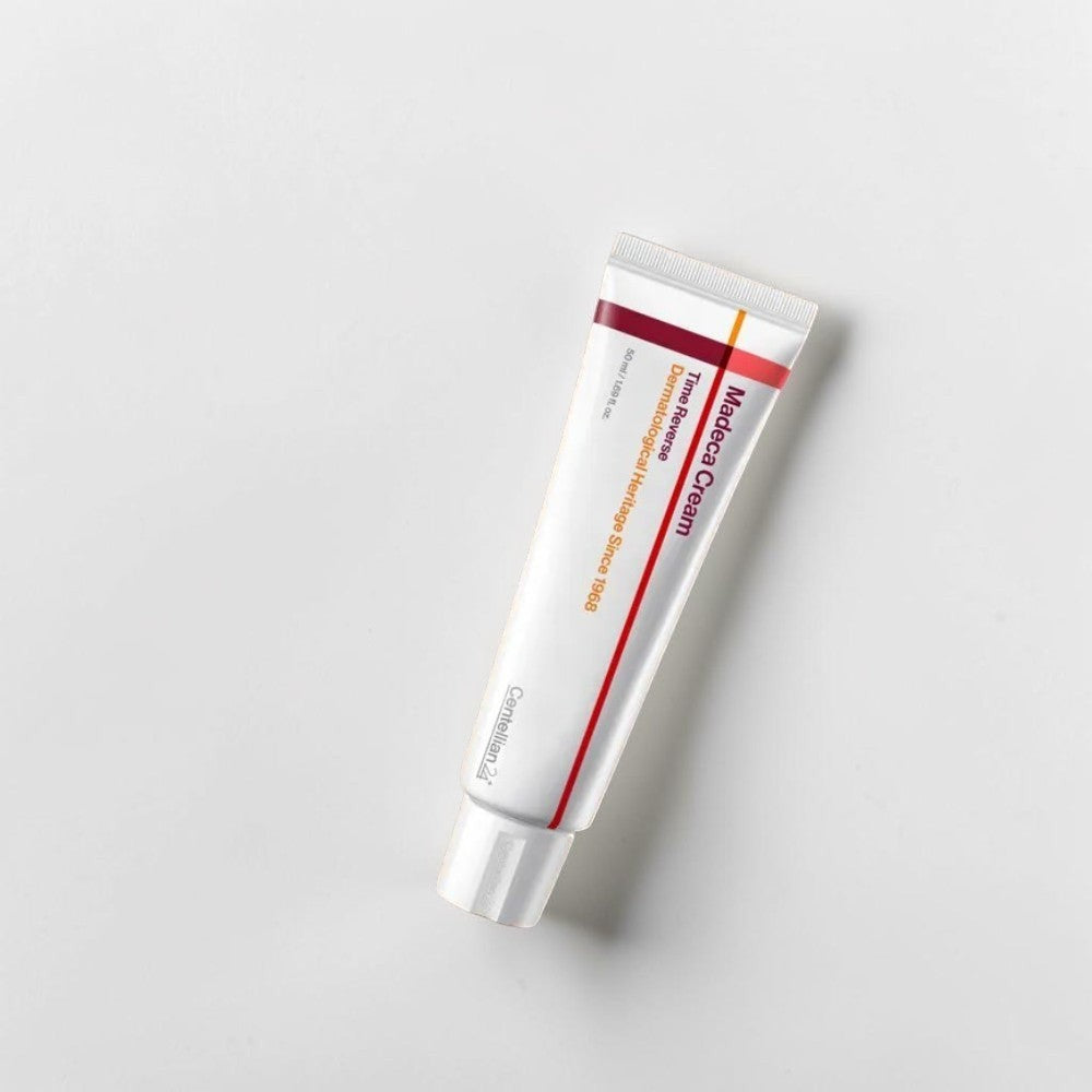 Skin TOGO Centellian 24 Madeca Cream Time Reverse anti-aging face cream in a white 50ml tube with red accents.