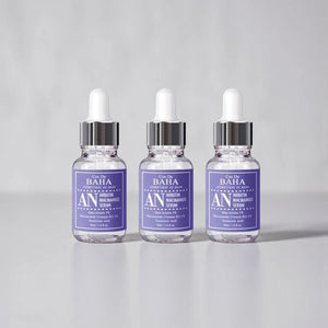 Skin TOGO Cos De BAHA AN Arbutin Niacinamide Serum bottles featuring purple labels for brightening skin tone