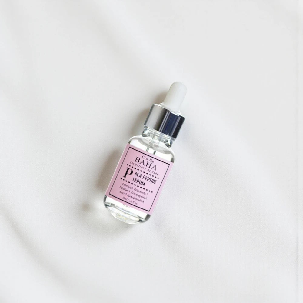 Skin TOGO Cos De BAHA P.M.A Peptide Serum in a 30ml glass dropper bottle with a pink label on a white background.