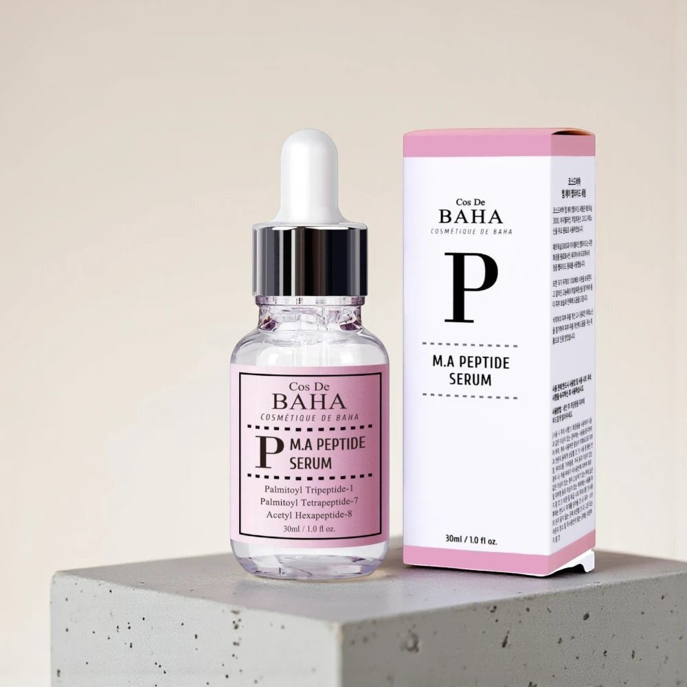 Skin TOGO Cos De BAHA P.M.A Peptide Serum bottle and box on a concrete block for anti-aging skincare.