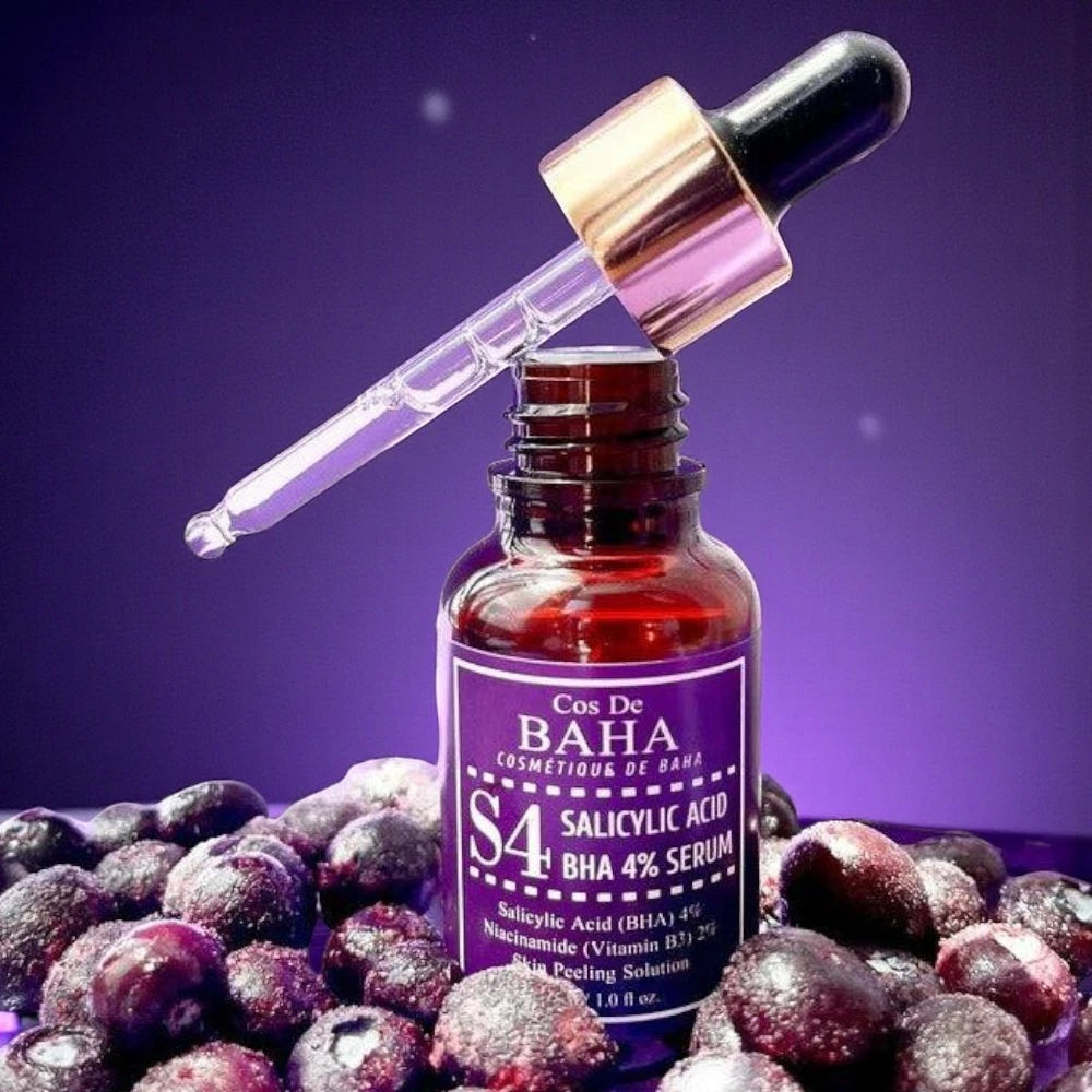 Skin TOGO Cos De BAHA S4 Salicylic Acid 4% BHA serum bottle with dropper, surrounded by fresh blueberries.