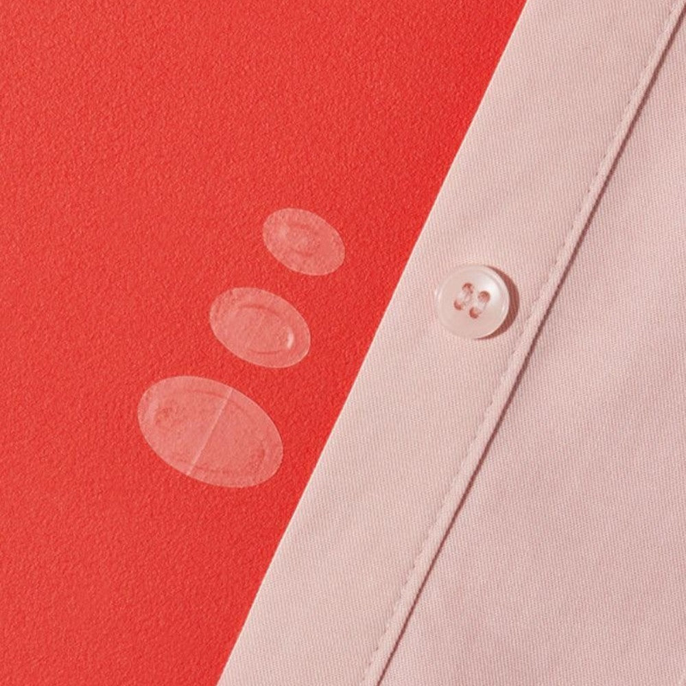 Skin TOGO Cosrx AC Collection hydrocolloid acne patches in three sizes on a red and light pink fabric background.