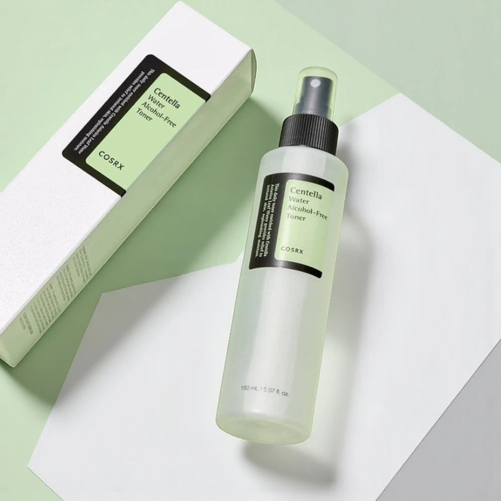 Skin TOGO Cosrx Centella Water Alcohol-Free Toner spray bottle and packaging box on a light green background.
