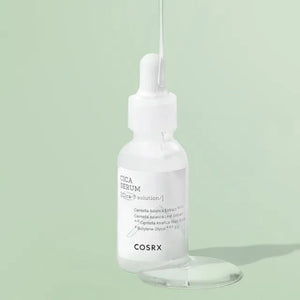 Skin TOGO COSRX Pure Fit Cica Serum in a clear bottle with a dropper, showing a drop of the lightweight liquid formula.