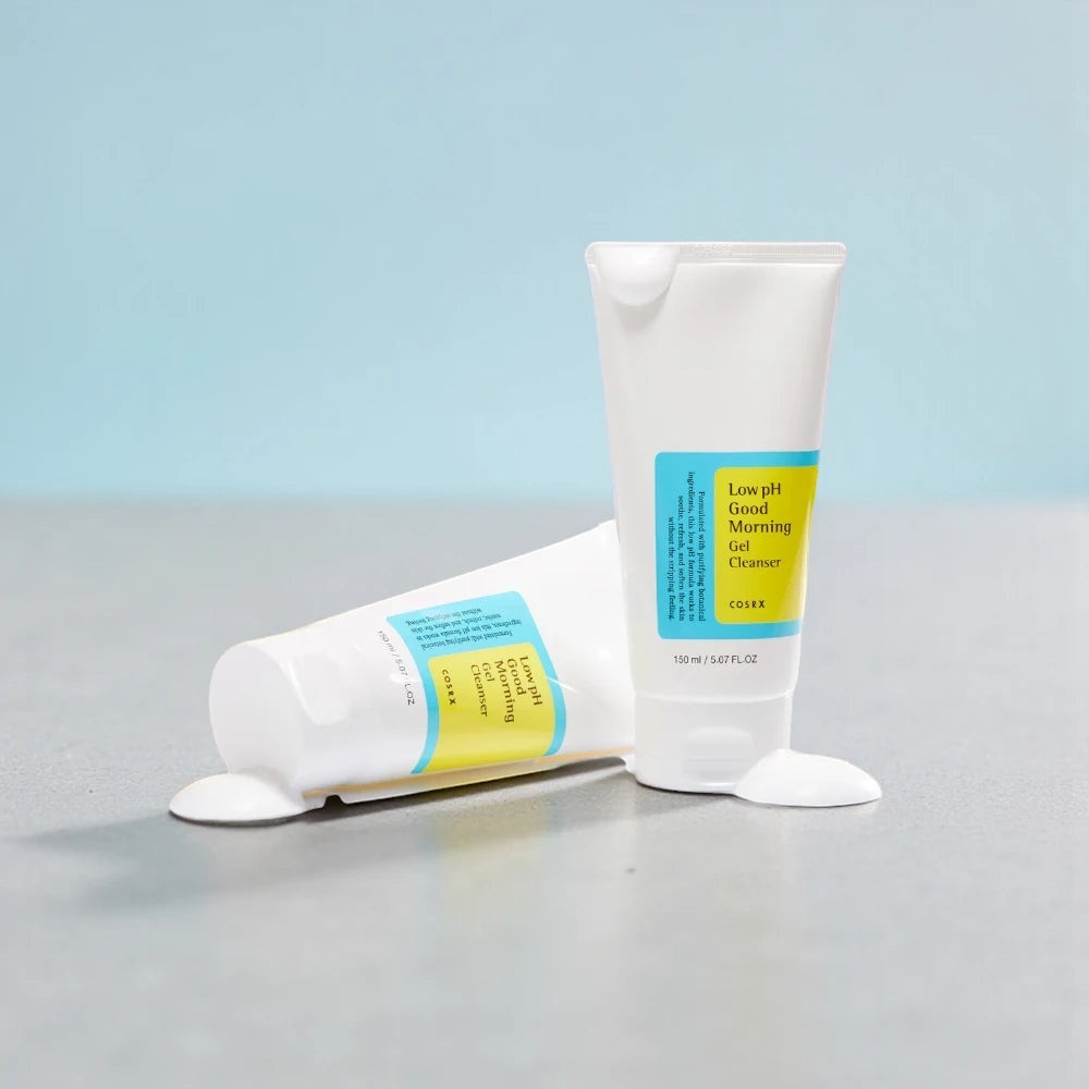 Skin TOGO Cosrx Low pH Good Morning Gel Cleanser in white tubes with yellow labels on a light blue background