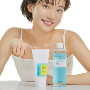 Skin TOGO model pointing at COSRX Low pH Niacinamide Micellar Cleansing Water and Good Morning Gel Cleanser