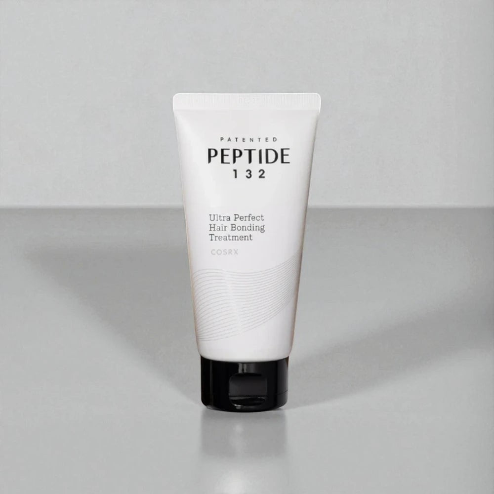 Skin TOGO COSRX Peptide-132 Ultra Perfect Hair Bonding Treatment in a white 120ml squeeze tube for damaged hair.