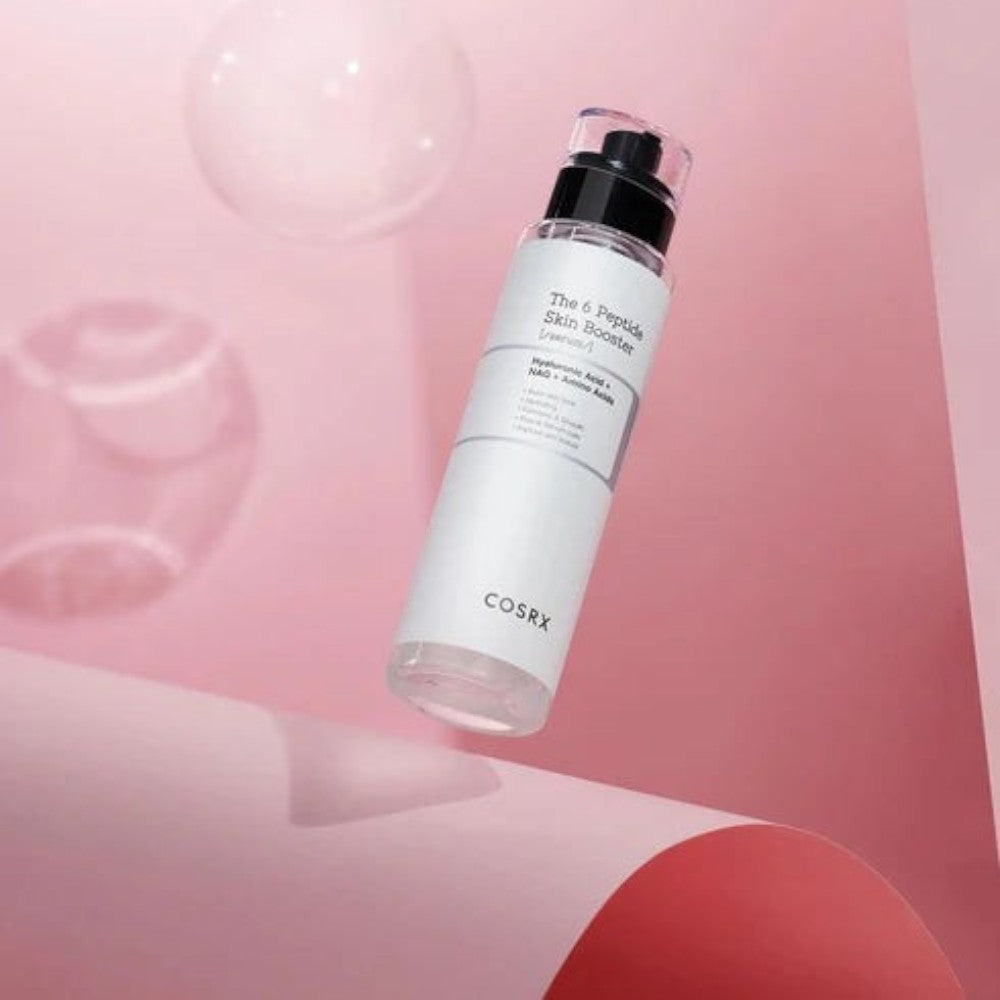 Skin TOGO COSRX The 6 Peptide Skin Booster serum bottle floating against a soft pink abstract background
