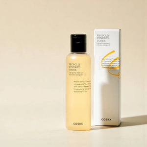 Skin TOGO COSRX Full Fit Propolis Synergy Toner bottle and packaging box on a neutral beige background.