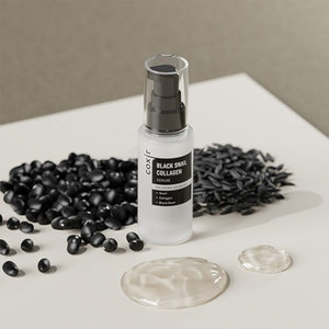 Skin TOGO Coxir Black Snail Collagen Serum bottle surrounded by black beans and drops of snail mucin essence.