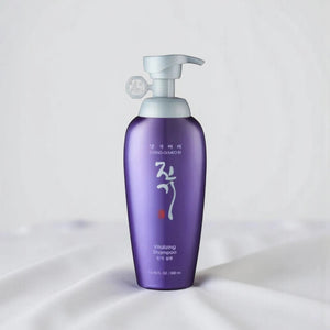 Skin TOGO Daeng Gi Meo Ri Vitalizing Shampoo in a purple 500ml pump bottle for hair loss prevention.