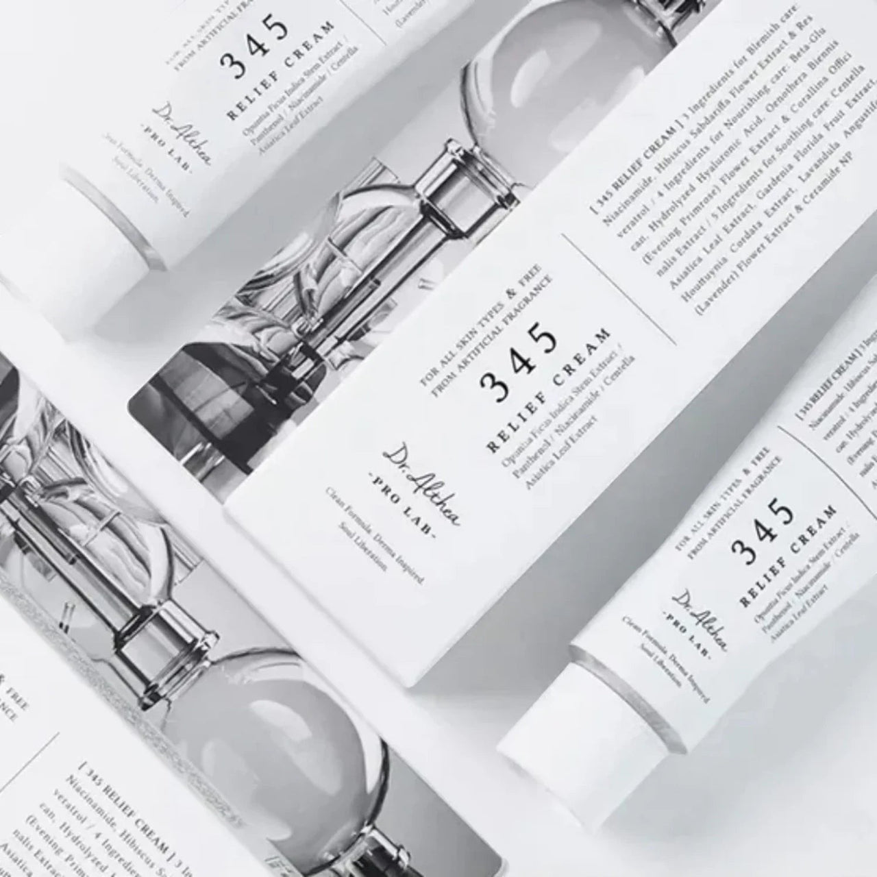 Skin TOGO Dr.Althea 345 Relief Cream tubes and packaging boxes featuring minimalist white design for sensitive skin