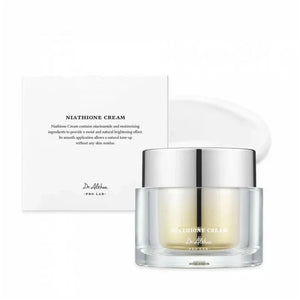 Skin TOGO Dr.Althea Niathione Cream in a luxury glass jar with its white product box for brightening and hydration.
