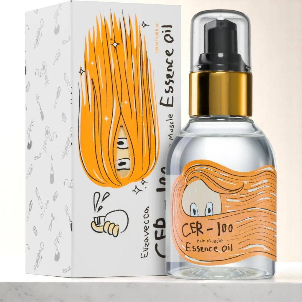 Skin TOGO Elizavecca CER-100 Hair Muscle Essence Oil bottle and packaging with orange cartoon hair illustration.