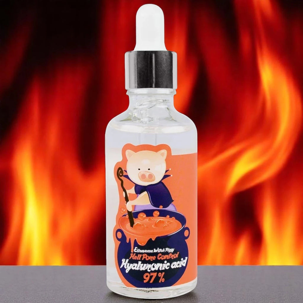 Skin TOGO Elizavecca Witch Piggy Hell Pore Control serum bottle with dropper against a fiery background