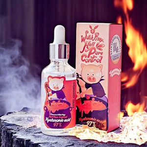 Skin TOGO Elizavecca Witch Piggy Hell Pore Control hyaluronic acid serum bottle and box on a smoky, fiery background.