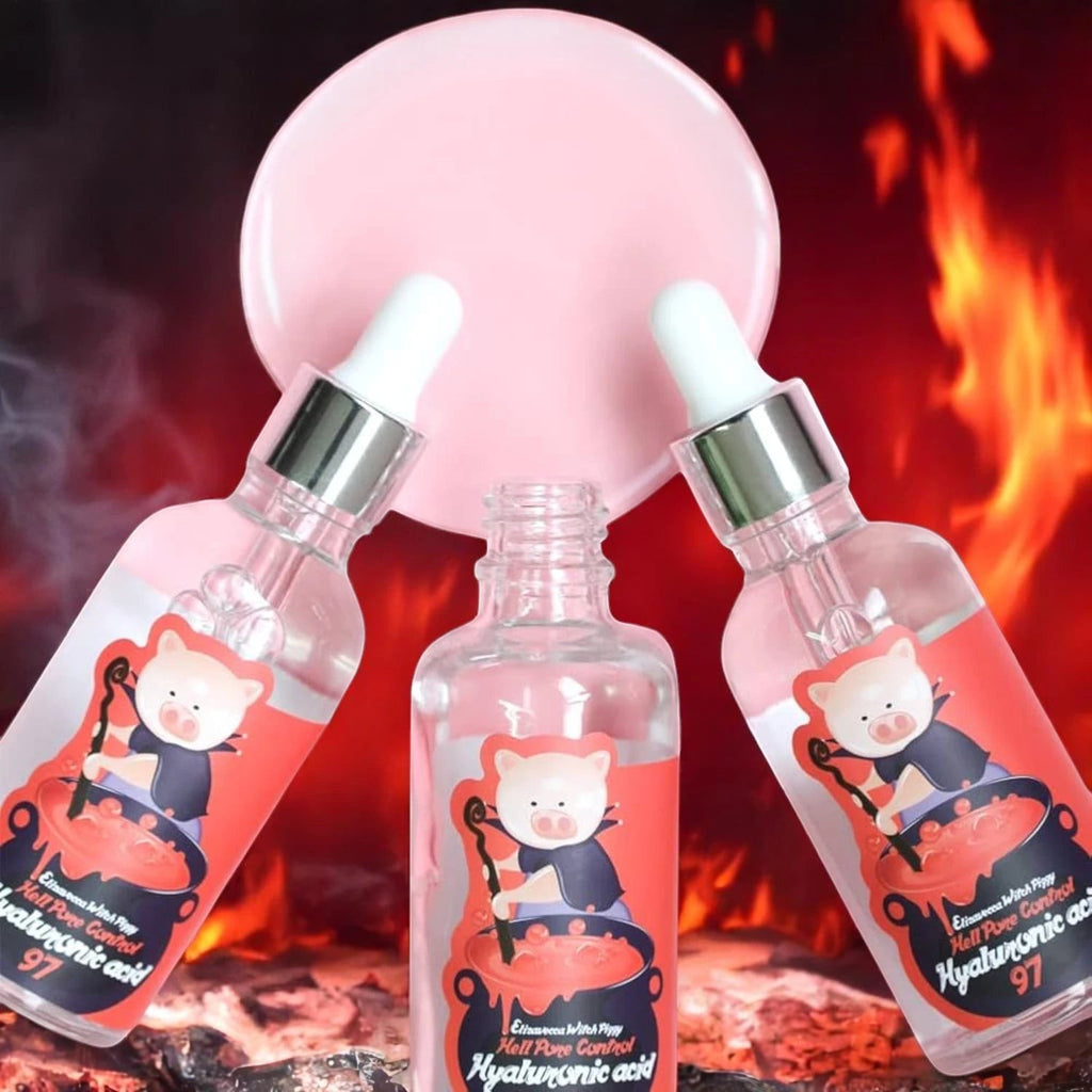 Skin TOGO Elizavecca Witch Piggy Hell Pore Control serum bottles with dropper, featuring a cute pig character label.