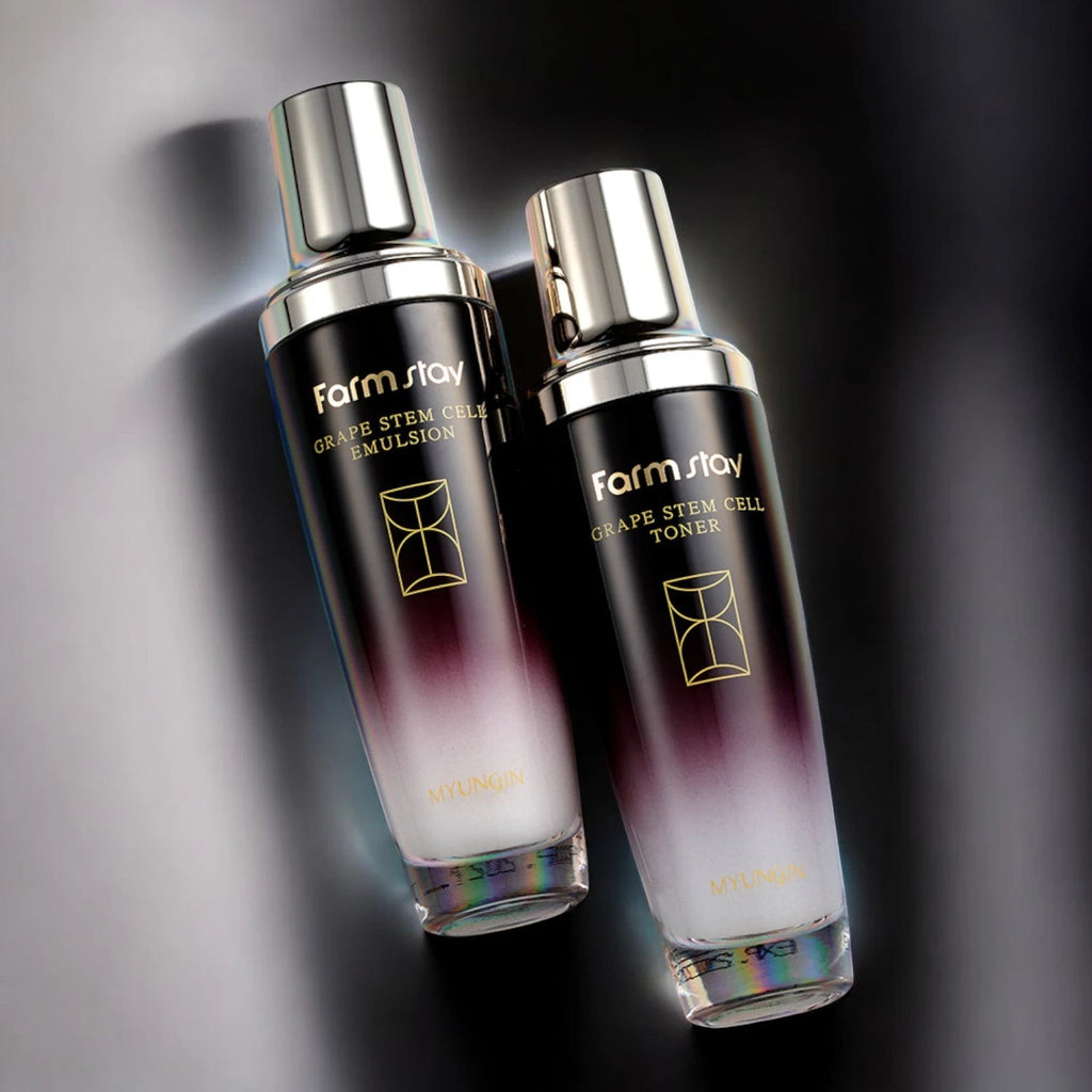 Skin TOGO Farmstay Grape Stem Cell emulsion and toner bottles with gradient purple and clear glass packaging.