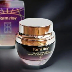 Skin TOGO Farmstay Grape Stem Cell Wrinkle Repair Eye Cream in a purple and black jar with a metallic gold lid.