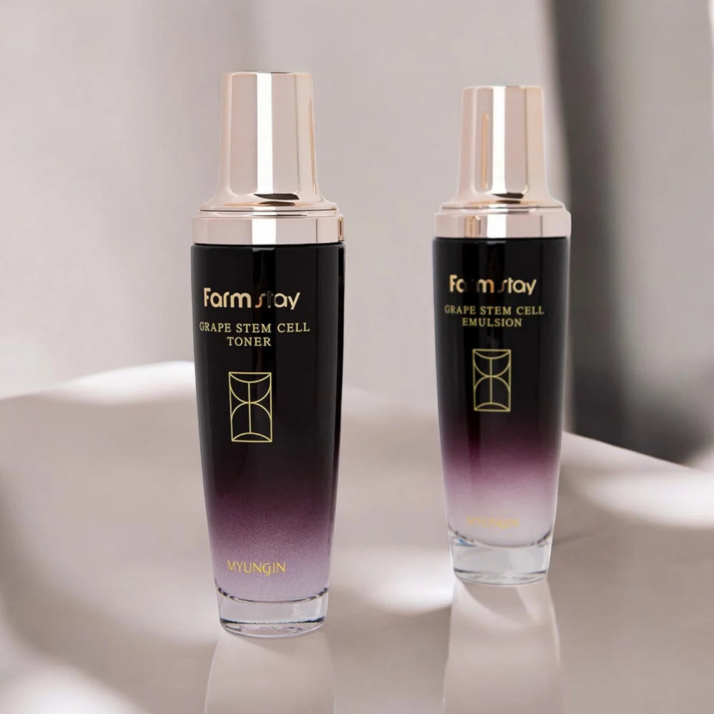 Skin TOGO Farmstay Grape Stem Cell Emulsion and Toner bottles in elegant black and purple gradient glass packaging.