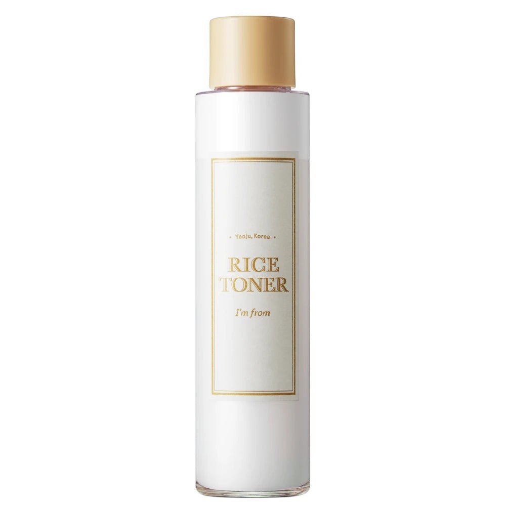 Skin TOGO I'm from Rice Toner 150ml bottle with milky liquid, gold cap, and minimalist label for brightening skin.