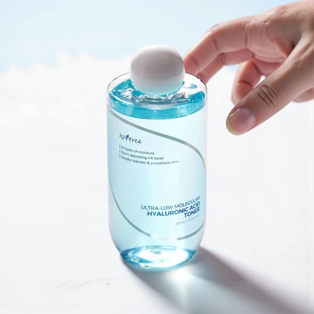 Skin TOGO Isntree Ultra-Low Molecular Hyaluronic Acid Toner in a clear 300ml bottle with blue liquid and white cap.