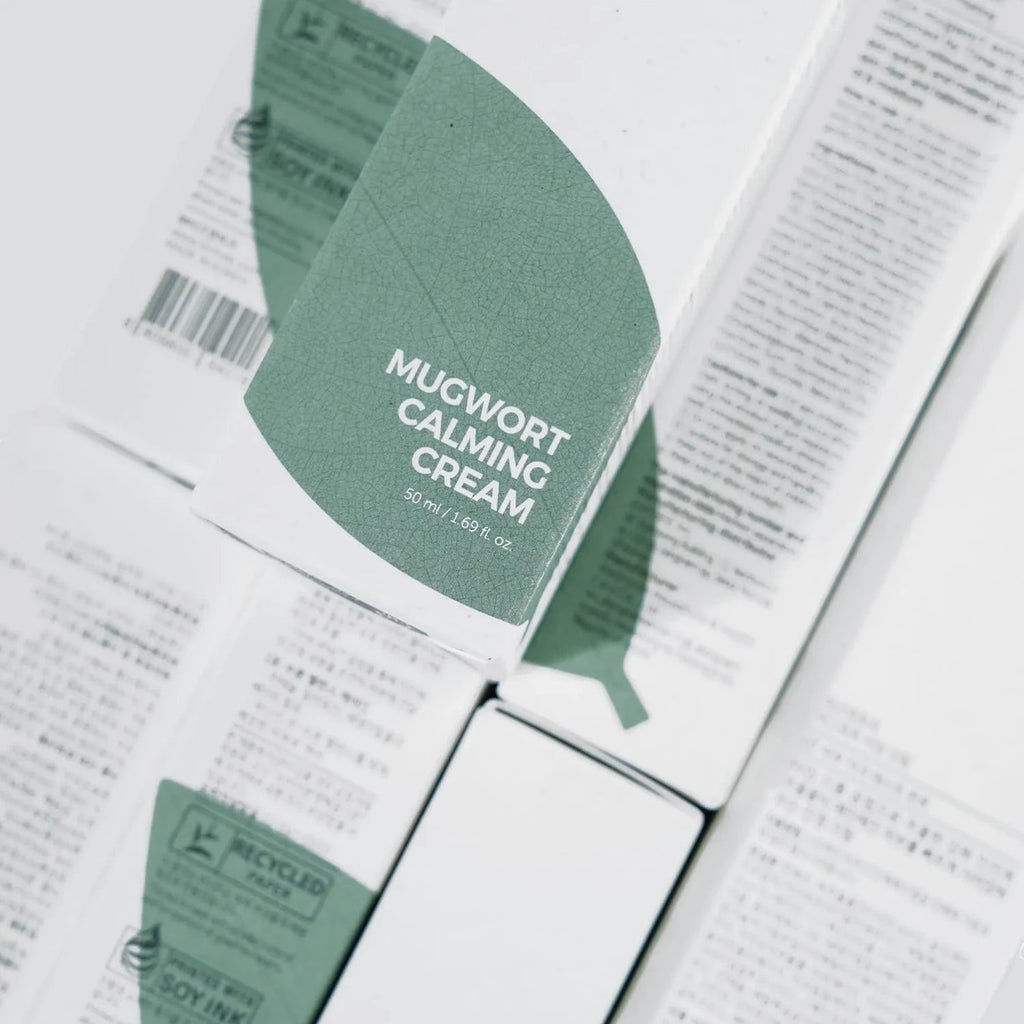 Skin TOGO Isntree Mugwort Calming Cream packaging with green leaf design on recycled paper box for sensitive skin