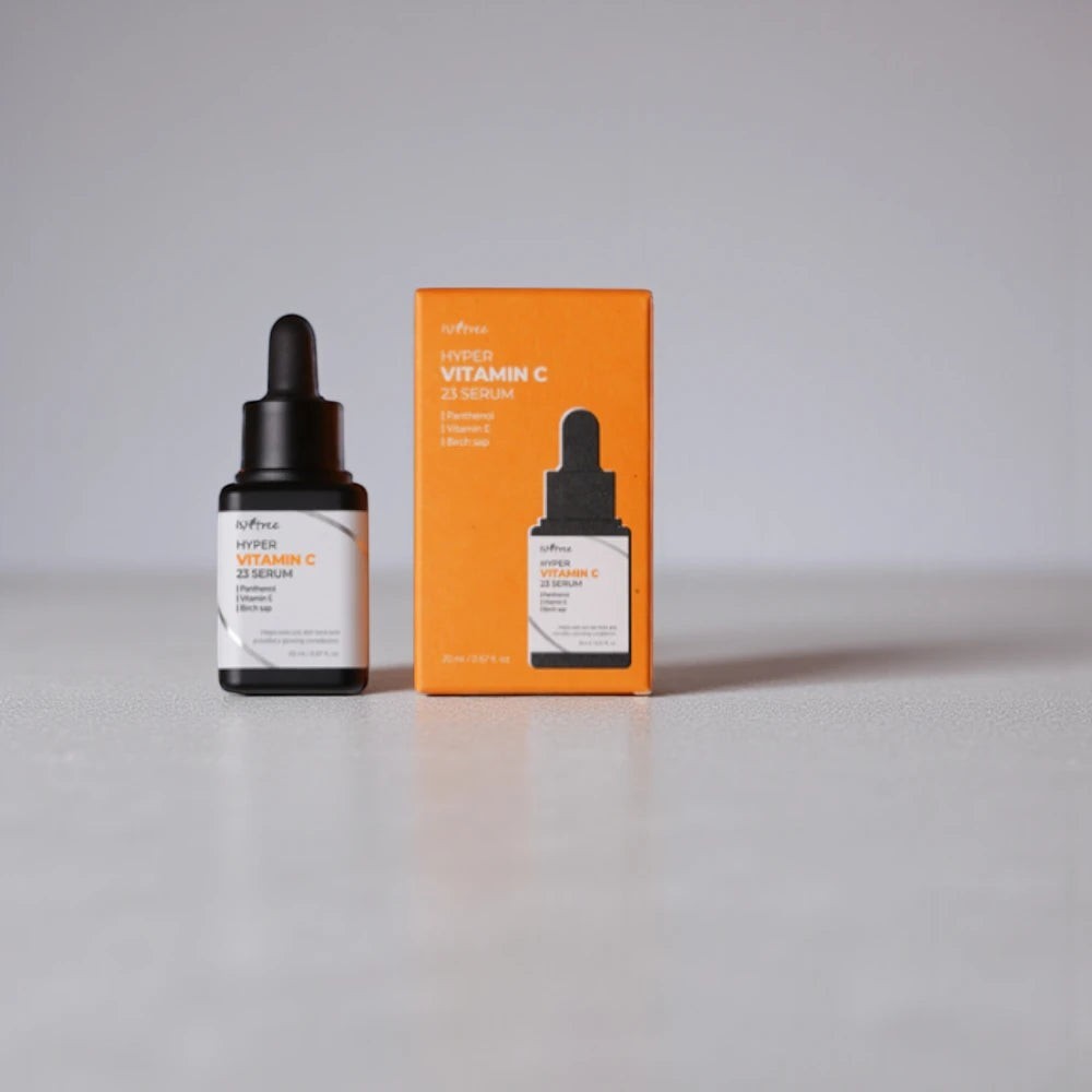 Skin TOGO Isntree Hyper Vitamin C23 serum bottle and orange box on a neutral surface for brightening skin care