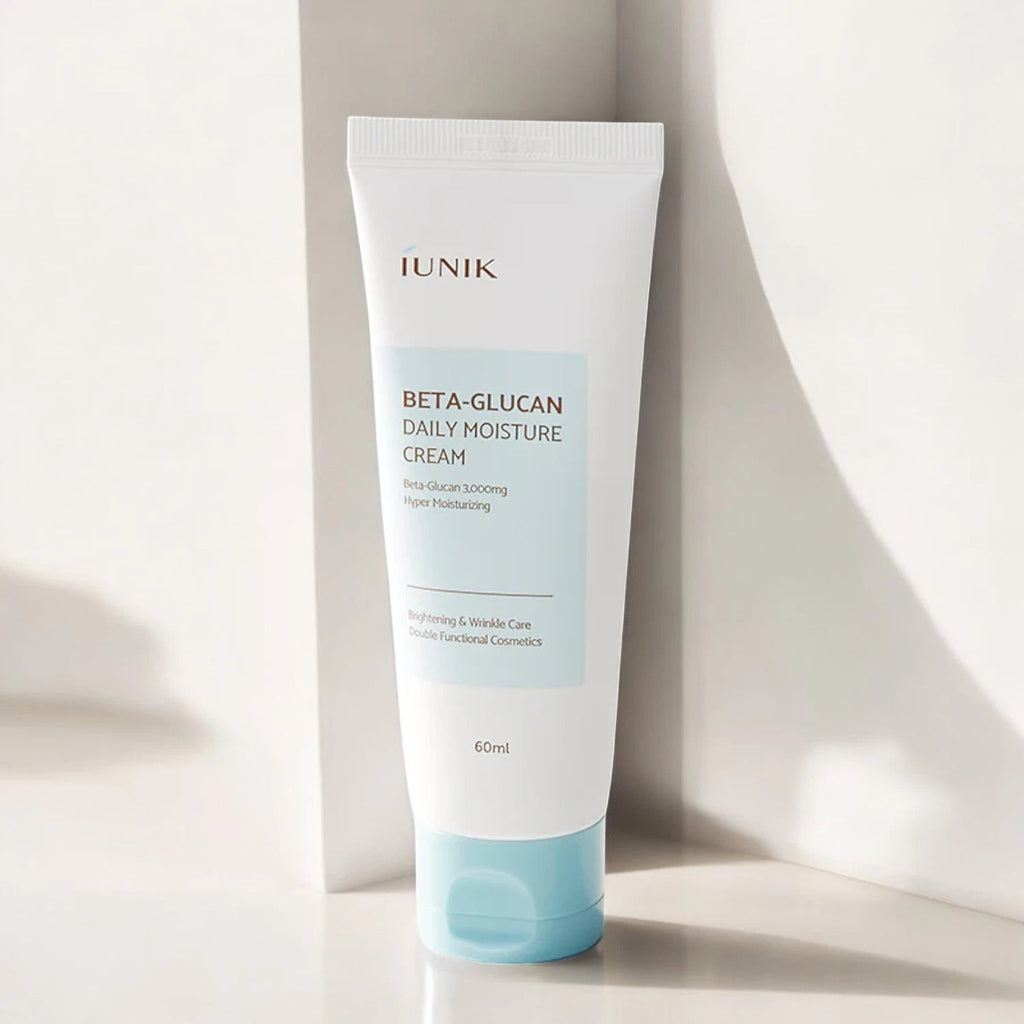 Skin TOGO iUNIK Beta Glucan Daily Moisture Cream in a white 60ml tube with light blue accents for sensitive skin.