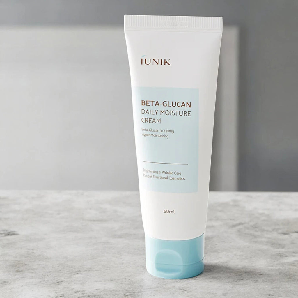 Skin TOGO iUNIK Beta Glucan Daily Moisture Cream in a white and light blue 60ml squeeze tube for sensitive skin.
