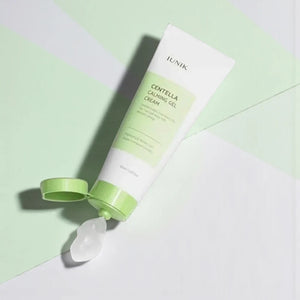 Skin TOGO iUNIK Centella Calming Gel tube with clear soothing gel texture on a light green and white geometric background