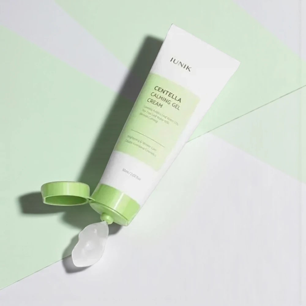 Skin TOGO iUNIK Centella Calming Gel tube with clear soothing gel texture on a light green and white geometric background